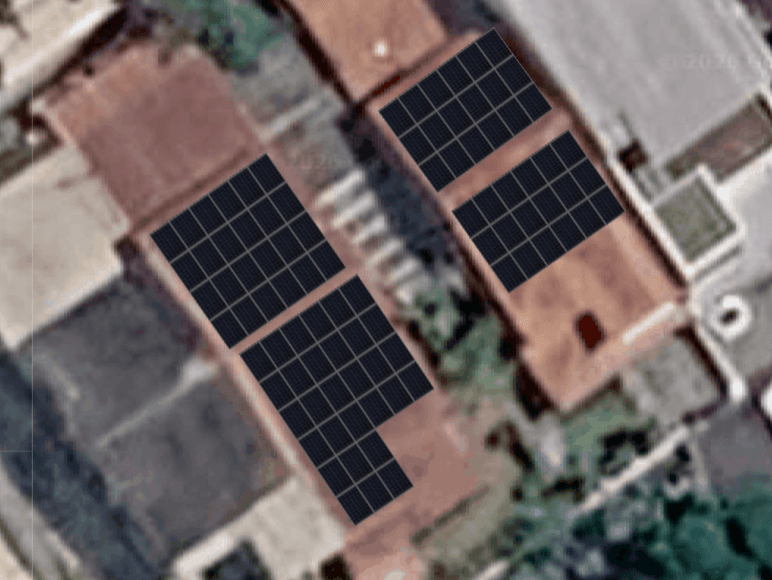 Aerial satellite view of two semi-detached homes with solar panels installed across both roofs